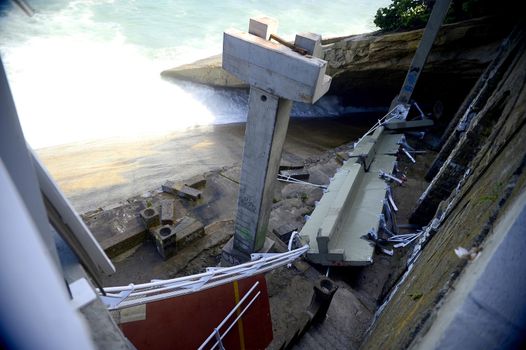 BRAZIL, Rio de Janeiro: View of a bike path after it collapsed, in Rio de Janeiro, on April 21, 2016. Inaugurated in January, the track was hit by strong waves. Two people were killed in the accident and one remains disappeared.