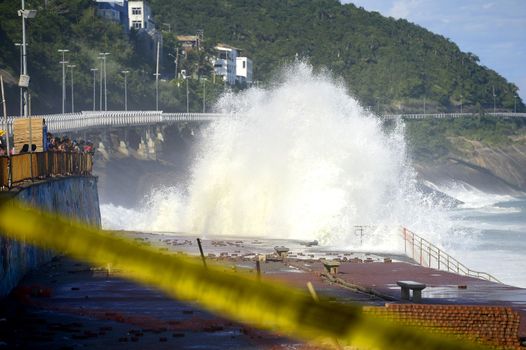 BRAZIL, Rio de Janeiro: Strong waves hit the shore as a bike path inaugurated in January collapsed in Rio de Janeiro, on April 21, 2016. Two people were killed in the accident and one remains disappeared.