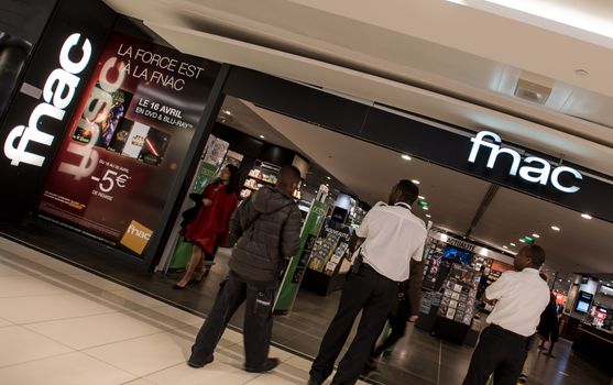 FRANCE, Paris: A picture is taken of a Fnac store on April 22, 2016 as the battle for Europe's third-largest electrical goods retailer Darty intensifies as Conforama, owned by South African retail giant Steinhoff and French rival Fnac frantically tried to outbid each other. Five new offers in less than 24 hours on April 21, 2016 lifted Darty shares by more than 23 percent to their highest level since the end of 2010, valuing it at GBP 779 million (USD 1.1 billion, 990 million euros).