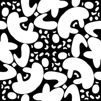 Repeating pattern background of black and white organic shapes