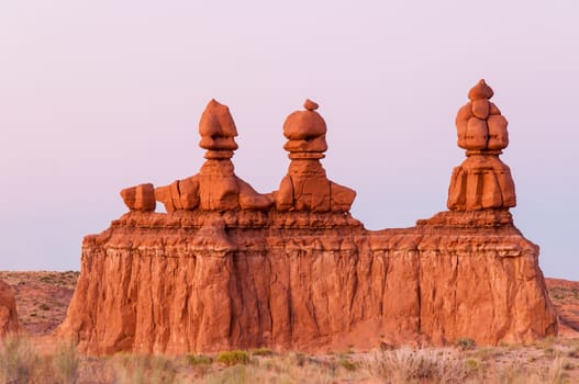 Purple gradient behind red rocks in Moab Utah