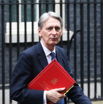UNITED-KINGDOM, London: British minister of Foreign affairs Philip Hammond stands as President Barack Obama is about to greet British Prime Minister David Cameron at Downing Street on April 22, 2016 in London, United-Kingdom. The President and his wife are currently on a brief visit to the UK where they will have lunch with HM Queen Elizabeth II at Windsor Castle and dinner with Prince William and his wife Catherine, Duchess of Cambridge at Kensington Palace. 