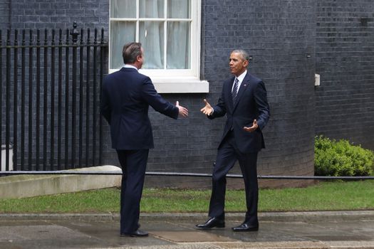 UNITED-KINGDOM, London: President Barack Obama (R) greets British Prime Minister David Cameron (L) as they meet at Downing Street on April 22, 2016 in London, United-Kingdom. The President and his wife are currently on a brief visit to the UK where they will have lunch with HM Queen Elizabeth II at Windsor Castle and dinner with Prince William and his wife Catherine, Duchess of Cambridge at Kensington Palace. 