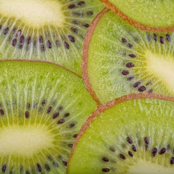 Beautiful kiwi fruit slices background