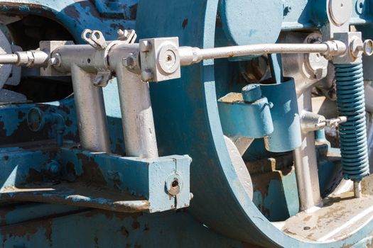 Parts of a rusting old industrial water pump