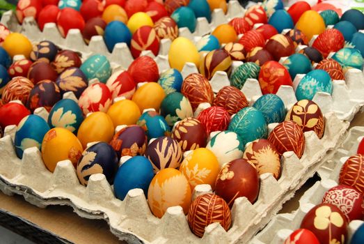 many various colorful easter eggs in eggboxes, Serbia