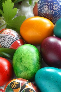 many various colorful easter eggs vertical background