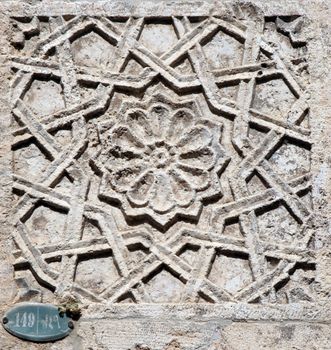 Arabic ornamental pattern. Marble fragment of old art
