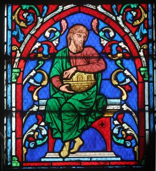 Colorful stained glass window in Cathedral Notre Dame de Paris