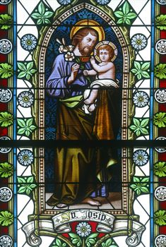 Saint Joseph holding baby Jesus