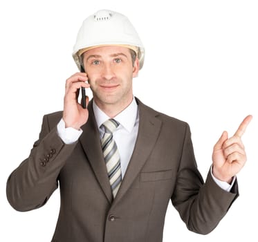 Happy businessman in helmet talking on mobile isolated on white background