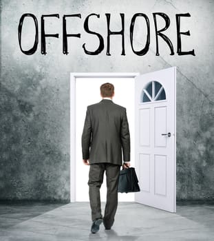 Businessman comes in door with light and with word offshore