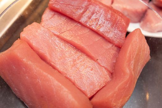 slices of fresh meat prepared for grill