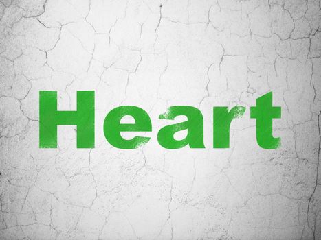 Healthcare concept: Green Heart on textured concrete wall background