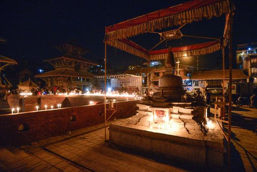 NEPAL, Patan: Nepalese residents gather to light candles during a vigil to mark the first anniversary of a devastating earthquake in Durbar Square in Patan, Kathmandu valley on April 24, 2016. Nepal on April 24 held services remembering thousands of people killed in a devastating earthquake one year ago, as authorities vow to expedite long-delayed reconstruction projects. Some 9,000 people were killed in the 7.8-magnitude quake that struck April 25, 2015 and its aftershocks.