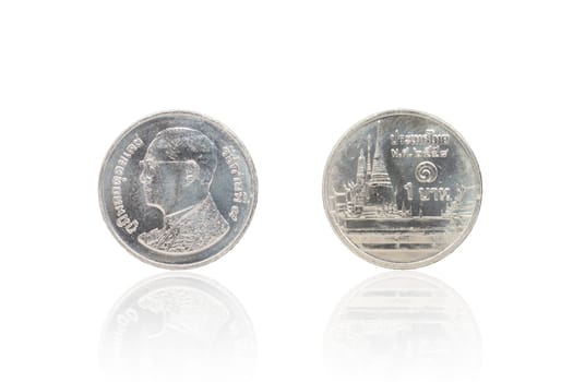 Front and back of Thai coin 1 baht reflect on white background.
