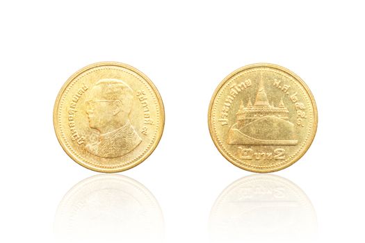 Front and back of Thai coin 2 baht reflect on white background.