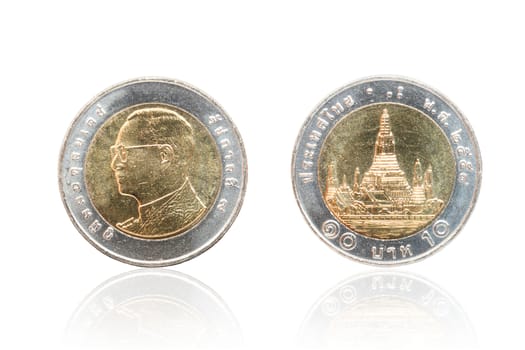 Front and back of Thai coin 10 baht reflect on white background.