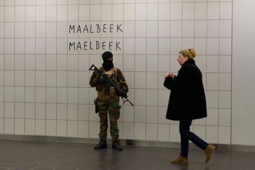 BELGIUM, BRUSSELS : Military personnel pictured on guard during the reopening of the Maelbeek-Maalbeek subway after the March 22 attacks, in Brussels, on Monday 17 November 2014. On Tuesday 22 March, two bombs exploded in the departure hall of Brussels Airport and another one in the Maelbeek - Maalbeek subway station, leaving 31 people dead and 250 injured. ISIL (Islamic State of Iraq and the Levant - Daesh) claimed responsibility for the attacks.