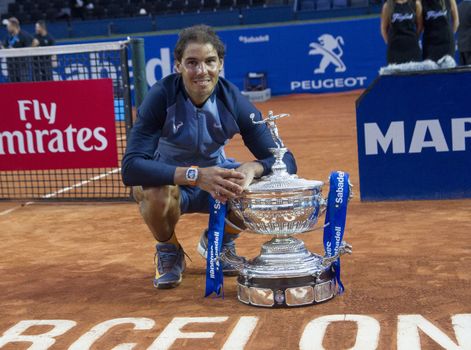 SPAIN, Barcelona: Spanish tennis player Rafael Nadal celebrates defeating Japanese tennis player Kei Nishikori during the final of the ATP Barcelona Open Conde de Godo tennis tournament in Barcelona on April 24, 2015. Rafael Nadal equalled Argentine legend Guillermo Vilas's record of 49 clay-court titles with his ninth Barcelona Open after overcoming defending champion Kei Nishikori 6-4, 7-5 today. 