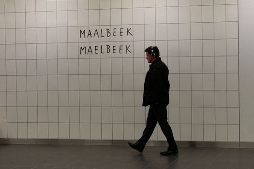 BELGIUM, Brussels : Passagers walk during the reopening of the Maelbeek - Maalbeek metro station on on April 25, 2016 in Brussels, which was closed since the 22 March attacks in the Belgian capital.Maelbeek - Maalbeek metro station was hit by one of the three Islamic State suicide bombers who struck Brussels airport and metro on March 22, killing 32 people and injuring hundreds.
