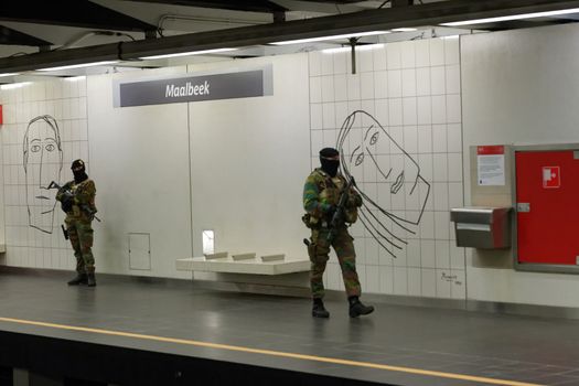 BELGIUM, BRUSSELS : Military personnel pictured on guard during the reopening of the Maelbeek-Maalbeek subway after the March 22 attacks, in Brussels, on Monday 17 November 2014. On Tuesday 22 March, two bombs exploded in the departure hall of Brussels Airport and another one in the Maelbeek - Maalbeek subway station, leaving 31 people dead and 250 injured. ISIL (Islamic State of Iraq and the Levant - Daesh) claimed responsibility for the attacks.