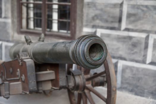 Close up detailed view of old black iron cannon ball.