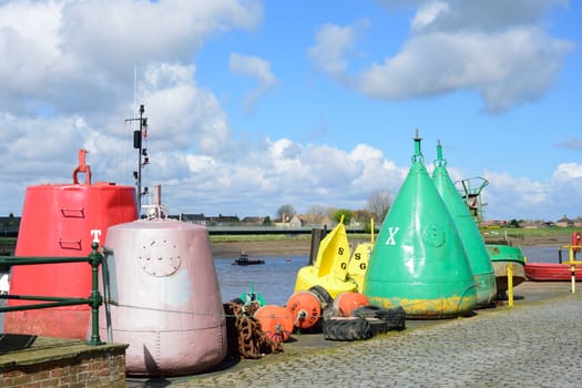 Large bouys on land for painting