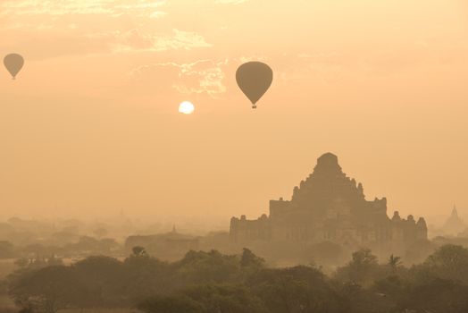 Dhammayangyi temple The biggest Temple in Bagan with balloons and sunrise, Myanmar