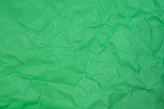 Crumpled paper texture - green paper sheet.