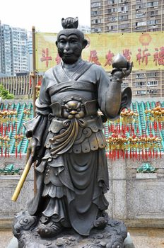 Hong Kong, China - June 25, 2014: Chinese Zodiac Bronze Monkey Stature at Sik Sik Yuen Wong Tai Sin Temple