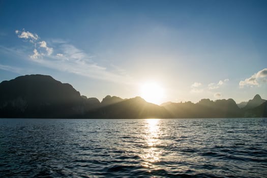 Sun rise behind mountain at Khao Sok National Park, Surat Thani ,Thailand.