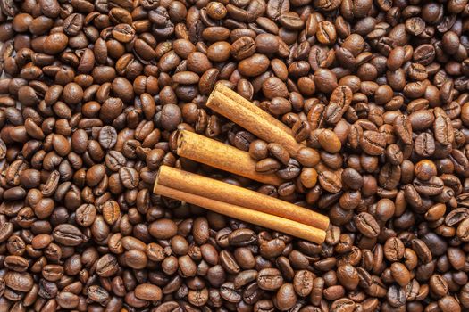 cinnamon sticks and coffee beans background