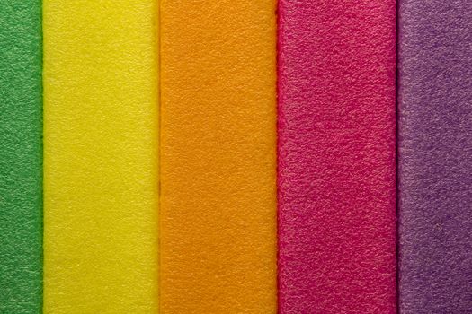 multicolored strips of yellow, pink, purple, orange background