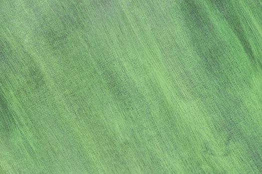 Abstract hand painted green canvas background texture. 