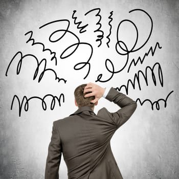 Rear view of businessman with waves out his head on grey wall background