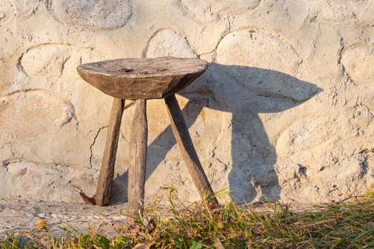 Old traditional wooden chair in romanian countryside