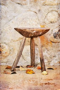 Old traditional wooden chair in romanian countryside