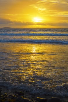 beal beach near ballybunion on the wild atlantic way ireland with a beautiful yellow sunset