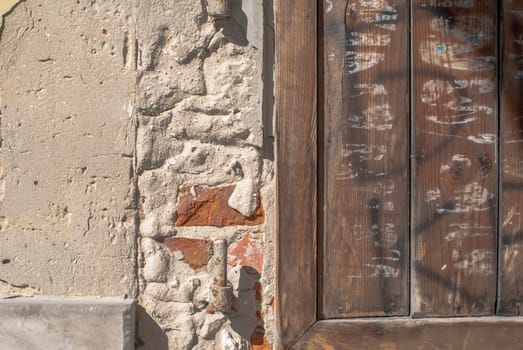 fragment of a brick wall that for a long time exposed to different climatic conditions