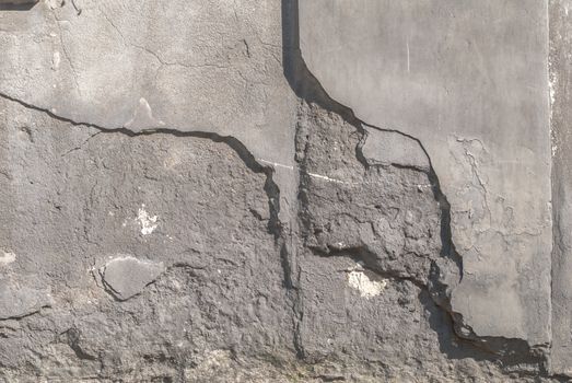 fragment of a concrete wall that for a long time exposed to different climatic conditions