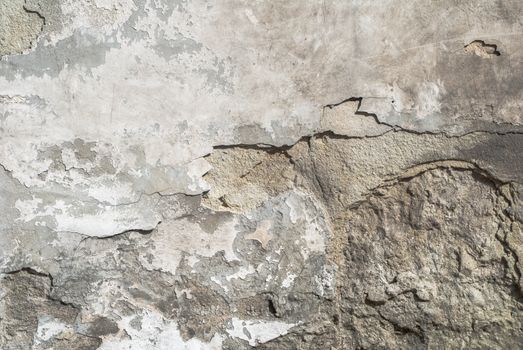 fragment of a concrete wall that for a long time exposed to different climatic conditions