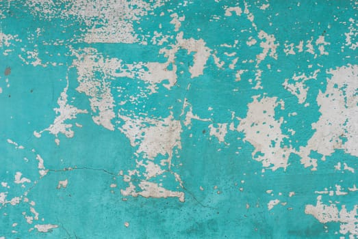 fragment of a concrete wall, which has undergone deformation due to prolonged exposure to various climatic conditions