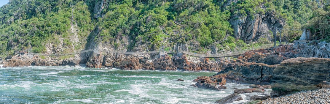 STORMS RIVER MOUTH, SOUTH AFRICA - FEBRUARY 29, 2016:  An aerial view of the three suspension bridges at the Mouth of the Storms River