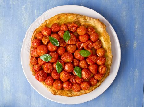 close up of rustic cherry tomato tarte tatin