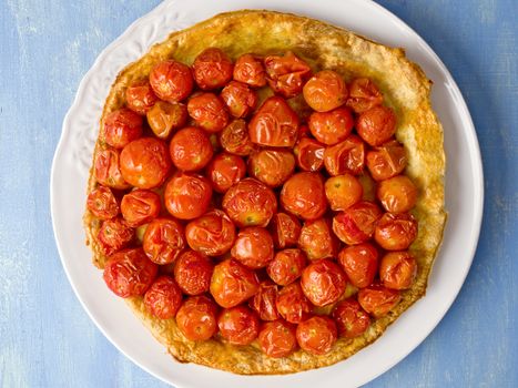 close up of rustic cherry tomato tarte tatin