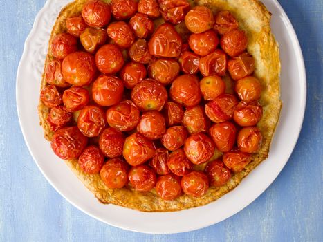 close up of rustic cherry tomato tarte tatin