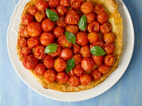 close up of rustic cherry tomato tarte tatin