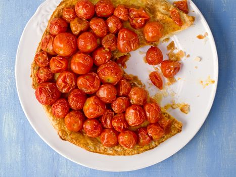 close up of rustic cherry tomato tarte tatin