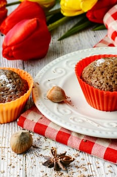 muffin tins and bouquet of fresh cut tulips